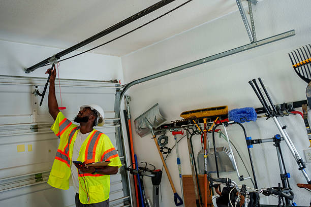 Professional Garage Door Maintenance technician working in Renton, WA